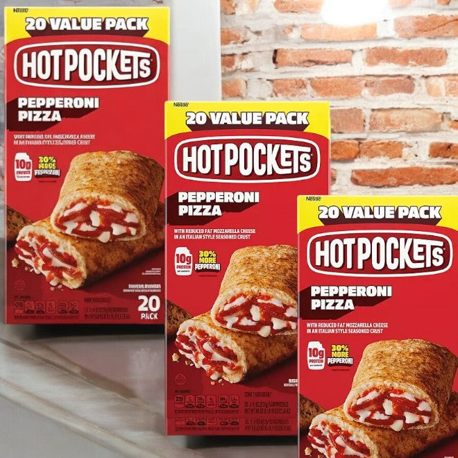 Three boxes of Hot Pockets Pepperoni Pizza Sandwiches-20ct-3 Case are displayed against a brick wall and countertop, highlighting an appealing variety pack option.