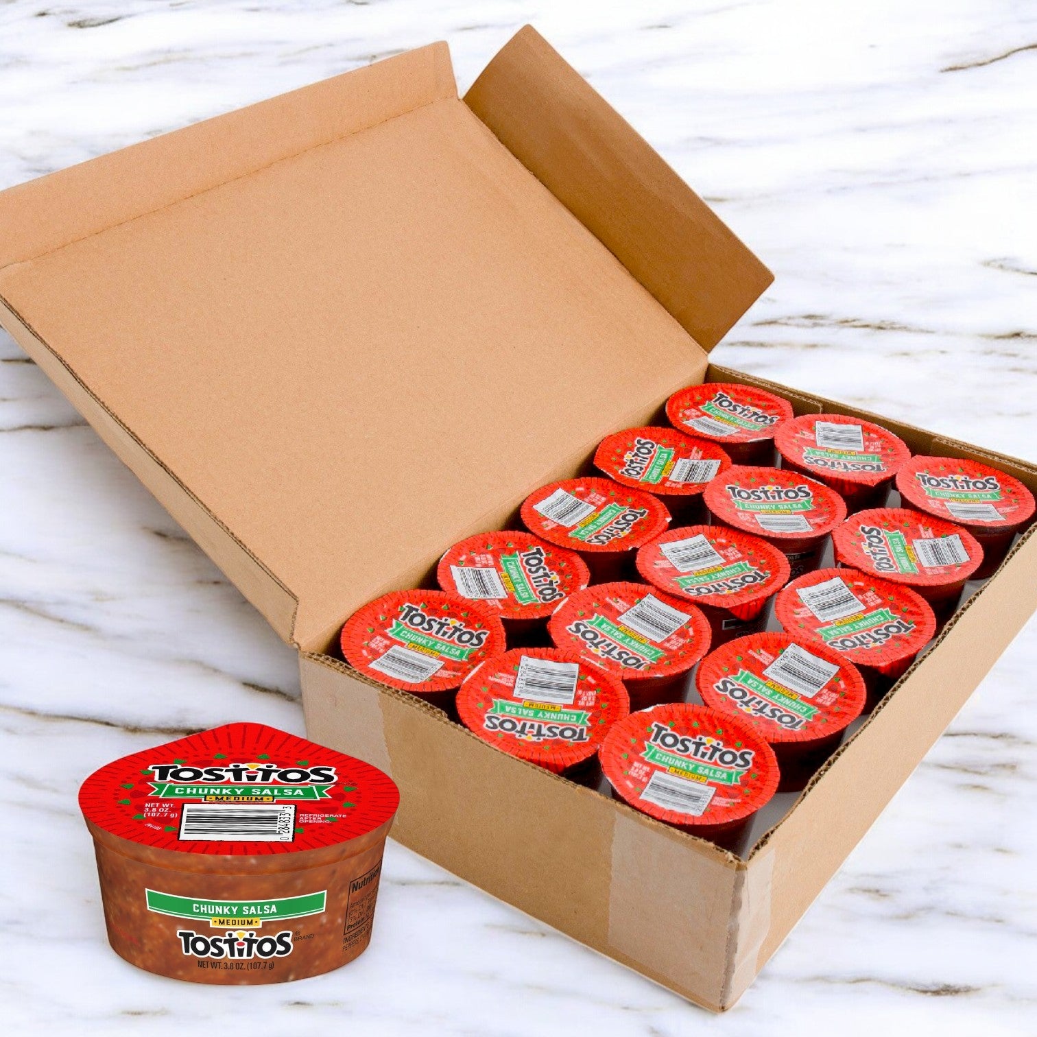 A 30 Pack box of Tostitos Medium Salsa To-Go Cups (3.8 oz each) by Tostitos sits on a marble surface, with one single-serve cup displayed in front.