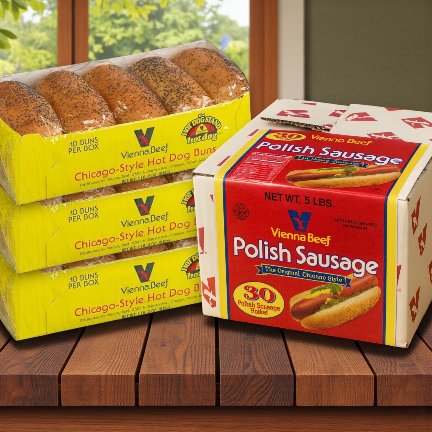 Three packs of Vienna Beef Poppy Seed Hot Dog Buns (10-count each) are stacked next to a box of Vienna 6" Skinless Polish Beef Sausage (30-count) by Vienna Beef on a wooden table with a blurred outdoor background.