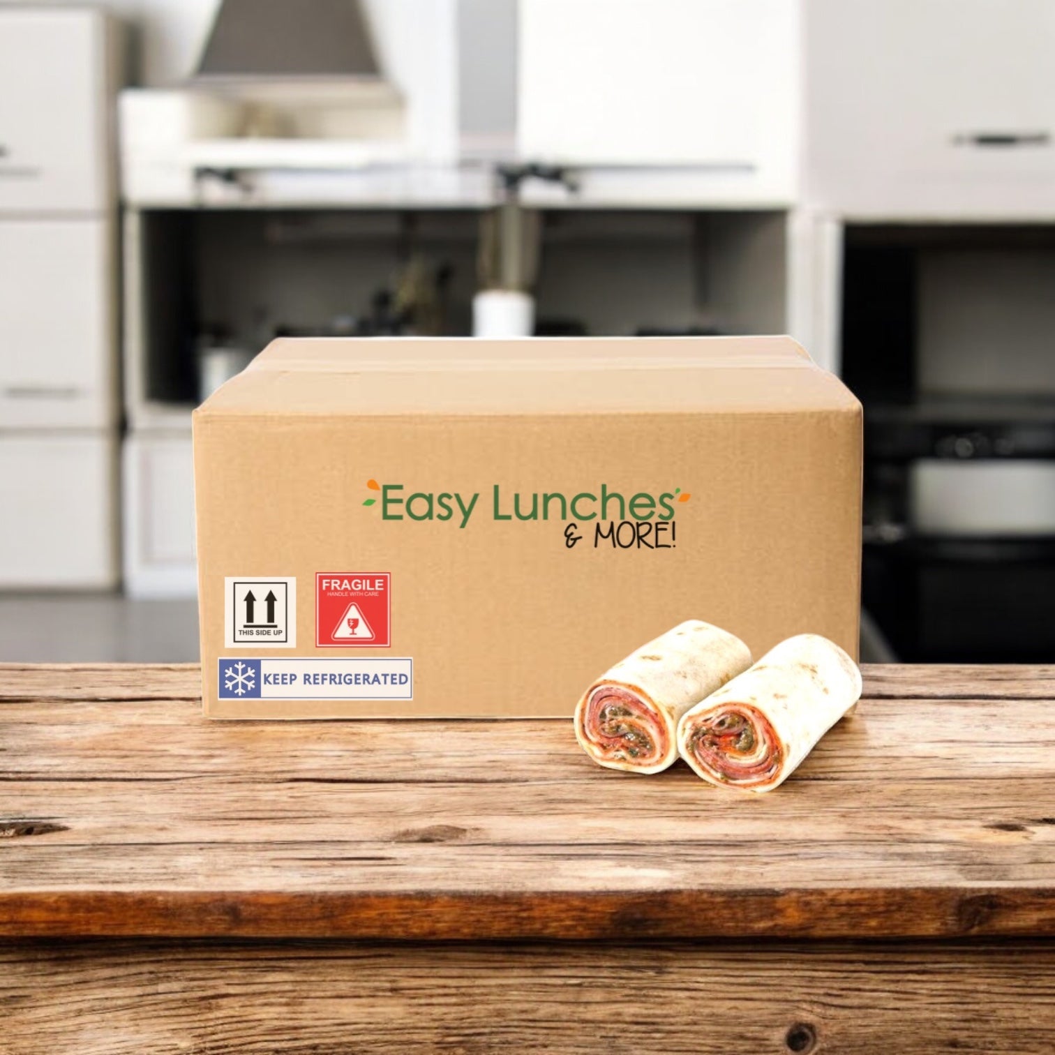 A cardboard box labeled "E.A. Sween Italian Style Wrap- 1 Case, 8 Count" sits on a wooden table with two wraps in front, set in a kitchen. Ships frozen; 30 days shelf life in the cooler once out of the freezer!.