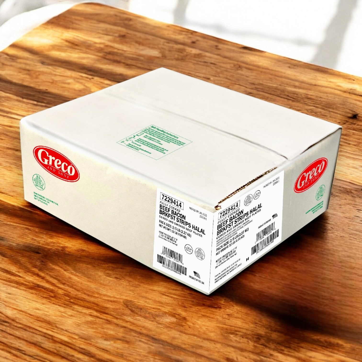 A box of Greco & Sons Halal Beef Bacon Strips (2 Pack, 5 lbs Each) rests on a wooden surface, its labels and barcodes clearly visible, evoking the savory appeal of sliced pepperoni.