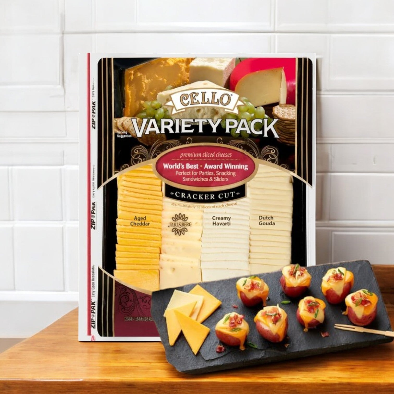 The "Cello Variety Pack" by Cello features premium sliced cheeses in a 2 lbs. pack, including Aged Cheddar, Creamy Havarti, and Dutch Gouda. Beside it is a charcuterie board with appetizers and cheese slices for a gourmet touch.