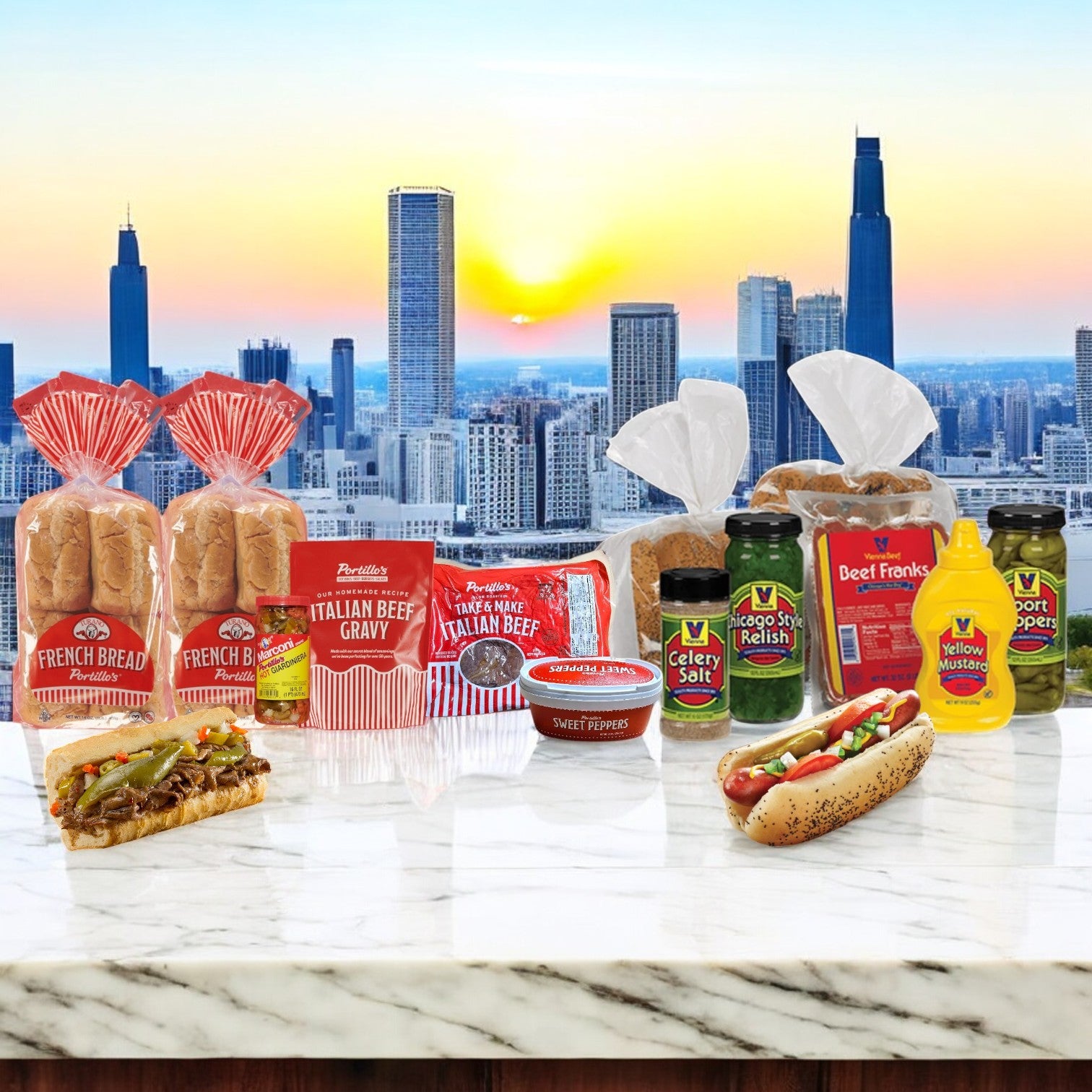 A Portillo's 16 Italian Beef Combo & Vienna 16 Pack Hot Dog Kit from Easy Lunches is artfully arranged on a marble surface. The setting sun paints the city skyline, capturing the essence of Chicago-style dining against this vibrant backdrop.