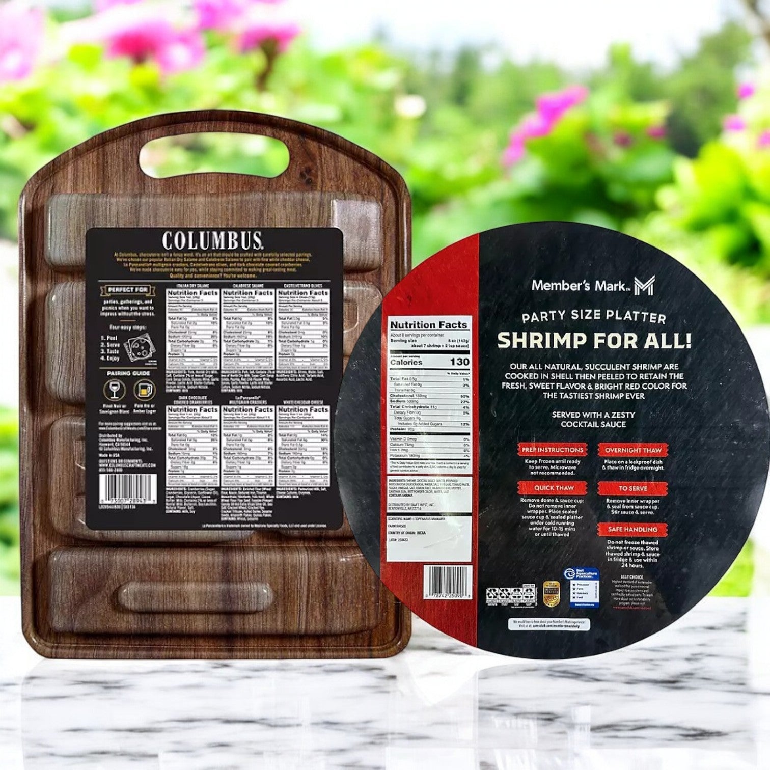 Two Easy Lunches products—Columbus Charcuterie Tasting Board & Member’s Mark Shrimp Platter with Cocktail Sauce—are displayed on an outdoor table, perfect for parties!.
