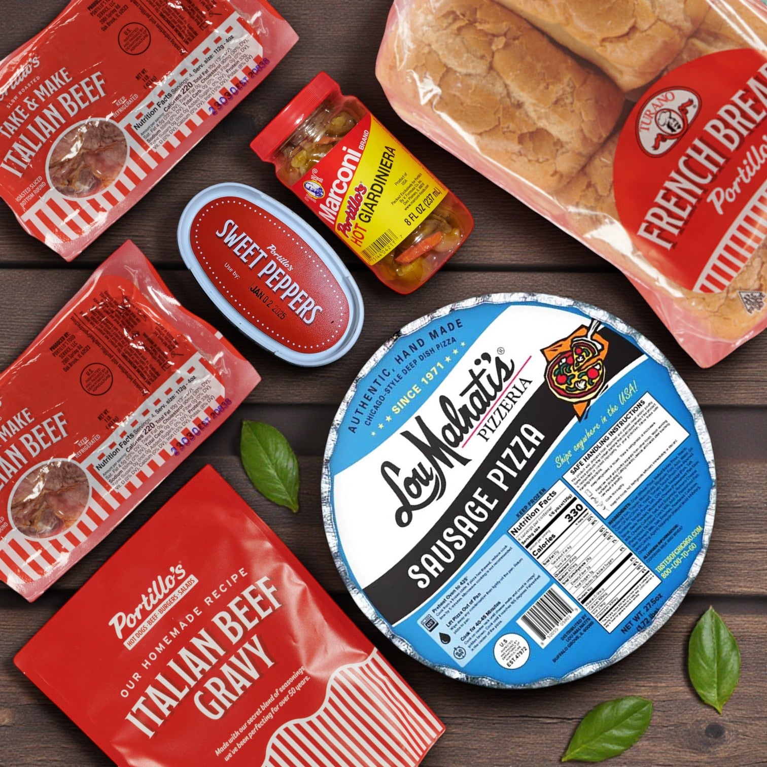 The Combo: Lou Malnati’s Deep Dish Sausage Pizza & Portillo’s Italian Beef Sandwich Kit from Chicago's Best – Iconic Eats from the Windy City is displayed with French bread rolls, giardiniera, and sweet peppers on a wooden surface.