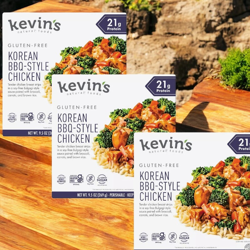 Three boxes of Kevin's Natural Foods Korean BBQ-Style Chicken - 3 Count by Kevin's are shown, featuring this keto and paleo-friendly meal with rice, broccoli, and carrots pictured on the packaging.