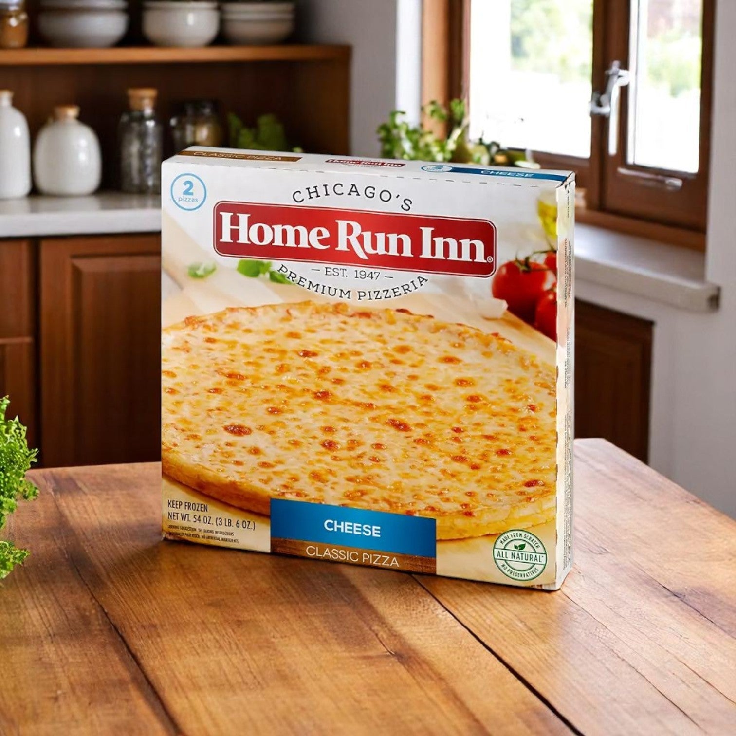 A box of Home Run Inn Classic Cheese Pizza, 27oz - 1 Pack, from Home Run Inn rests on a wooden kitchen counter with a window and assorted kitchen items in the background.