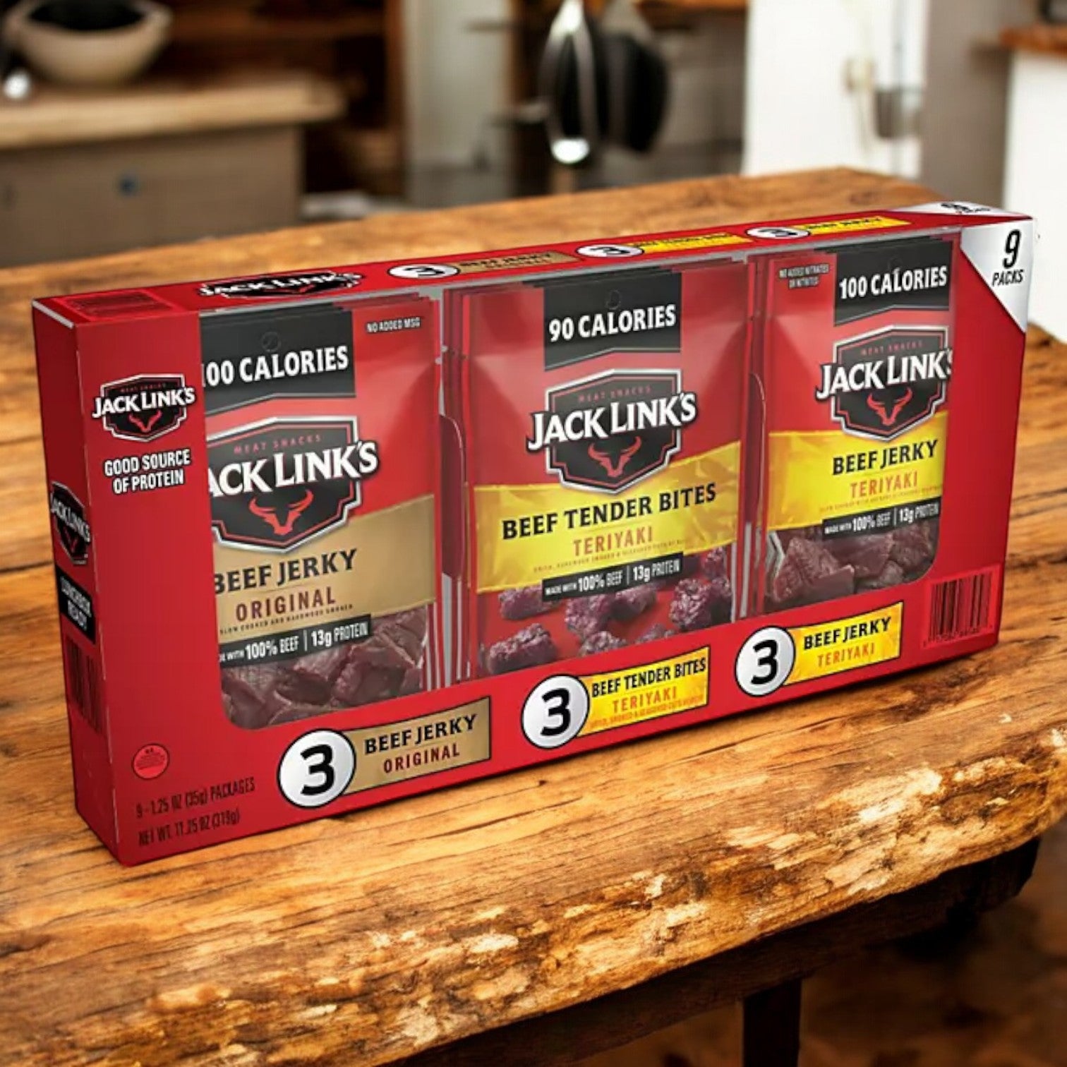 A Jack Link’s Beef Jerky Variety Pack, 9 Count, sits on a wooden kitchen table—a protein-packed snack in Original and Teriyaki flavors made from premium cuts of beef.