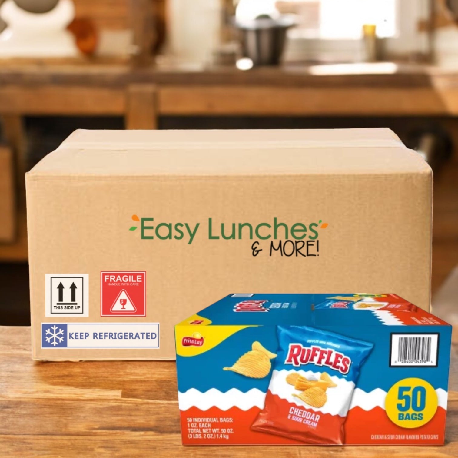 A cardboard box labeled "Easy Lunches & More" sits on a table, with a 50-count pack of Ruffle's Potato Chips, Cheddar & Sour Cream Flavored (1 oz each), placed in front as a savory snack.