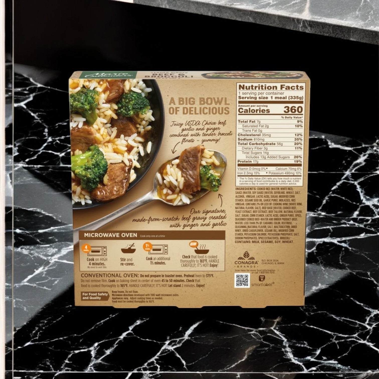 The image displays Marie Callender's Beef & Broccoli Bowl, Tender Ginger 11.8 oz., featuring ingredients like beef, broccoli, and rice in ginger soy sauce. The packaging includes nutritional info and heating instructions on the back and is placed on a black marble surface.