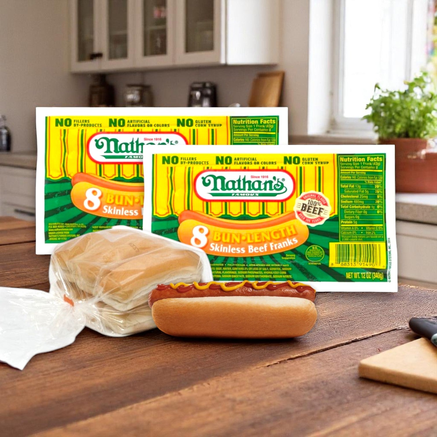 A hot dog with ketchup sits on a table in a kitchen, next to the Nathan’s Hot Dog Bundle—16 Count Hot Dogs and 16 Buns from Nathan’s Famous.