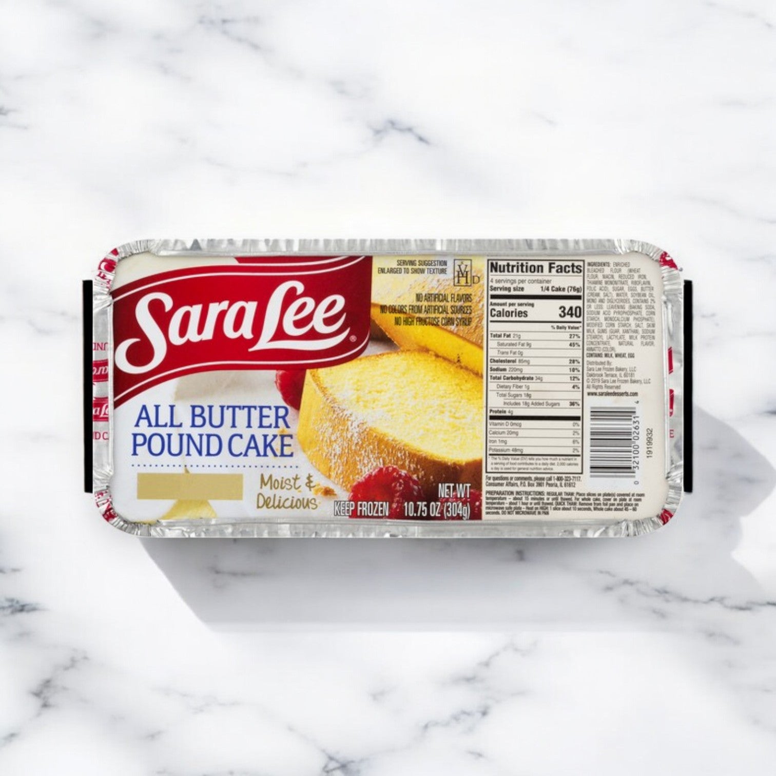Sarah Lee All Butter Pound Cake, 10.75 oz, 3 Pack, is shown in packaging on a white marble surface with nutrition facts visible on the right side of the label. This versatile dessert is perfect for any occasion.