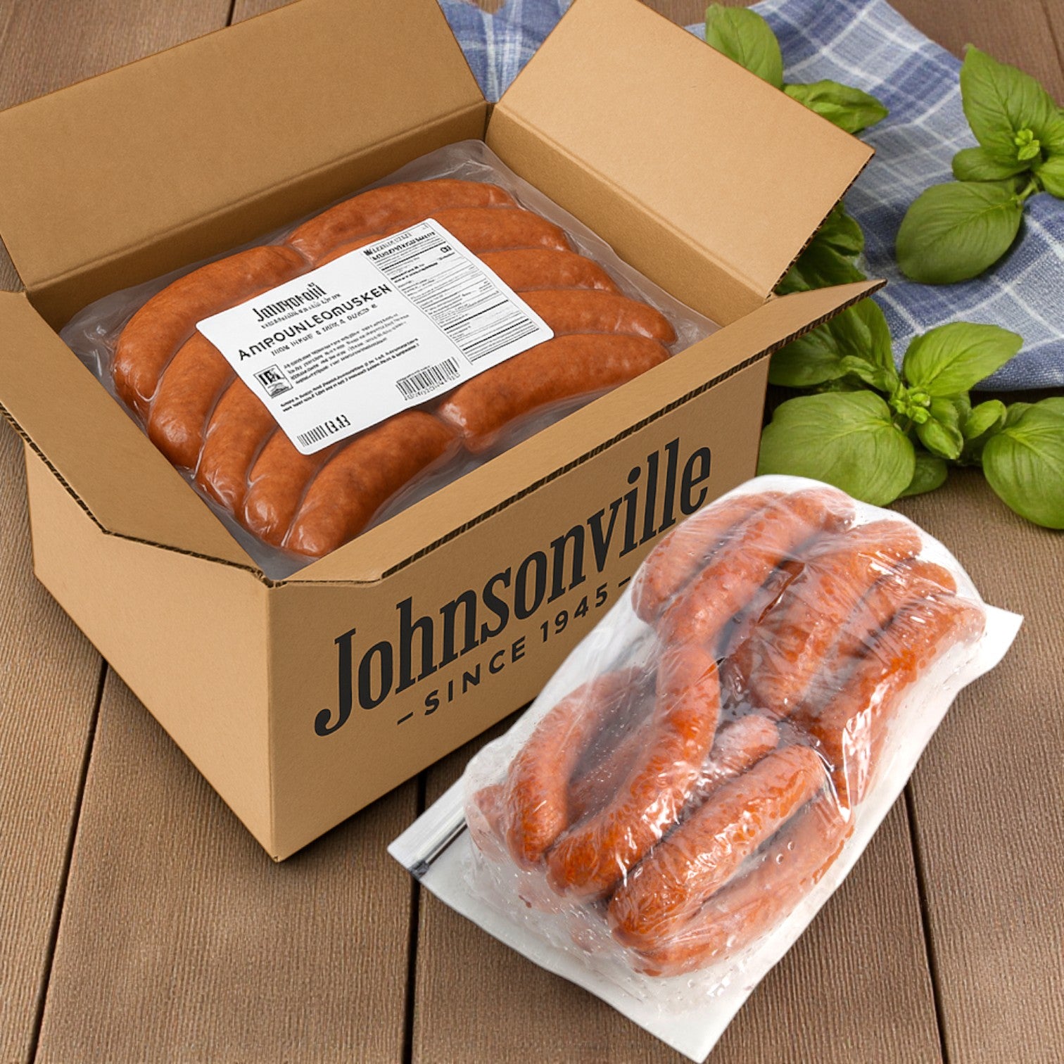 A box of Johnsonville Foods Andouille Sausage Link (4x1, 2/5 LB) features vacuum-sealed smoked sausages, with one displayed outside near green herbs—ideal for adding authentic flavor to Southern dishes or jambalaya.