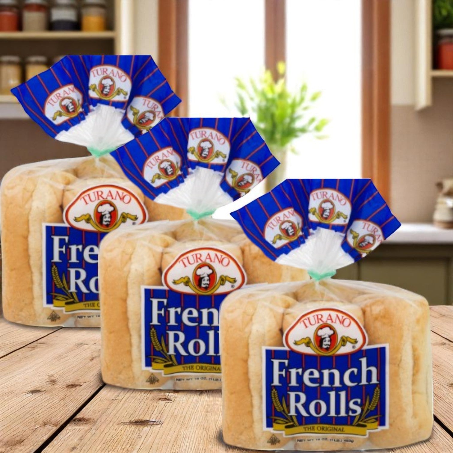 Three cases of Turano French Rolls (6 count, 2.7 oz each) are displayed on a wooden table with a kitchen background, highlighting these hearth-baked sandwich rolls from Turano Baking Company.