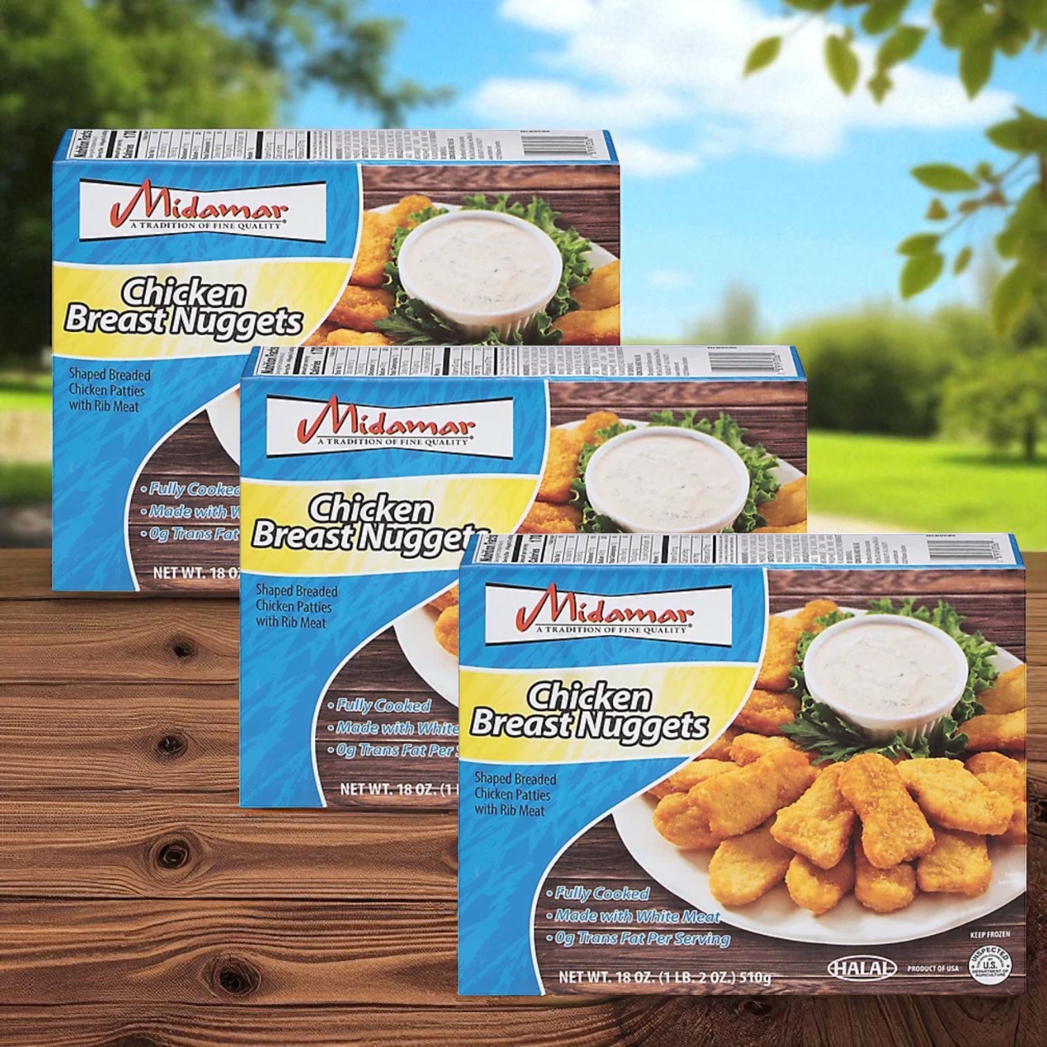 Three boxes of midamar Halal Chicken Breast Nuggets, 18 oz each, are displayed on a wooden surface with a green outdoor background.