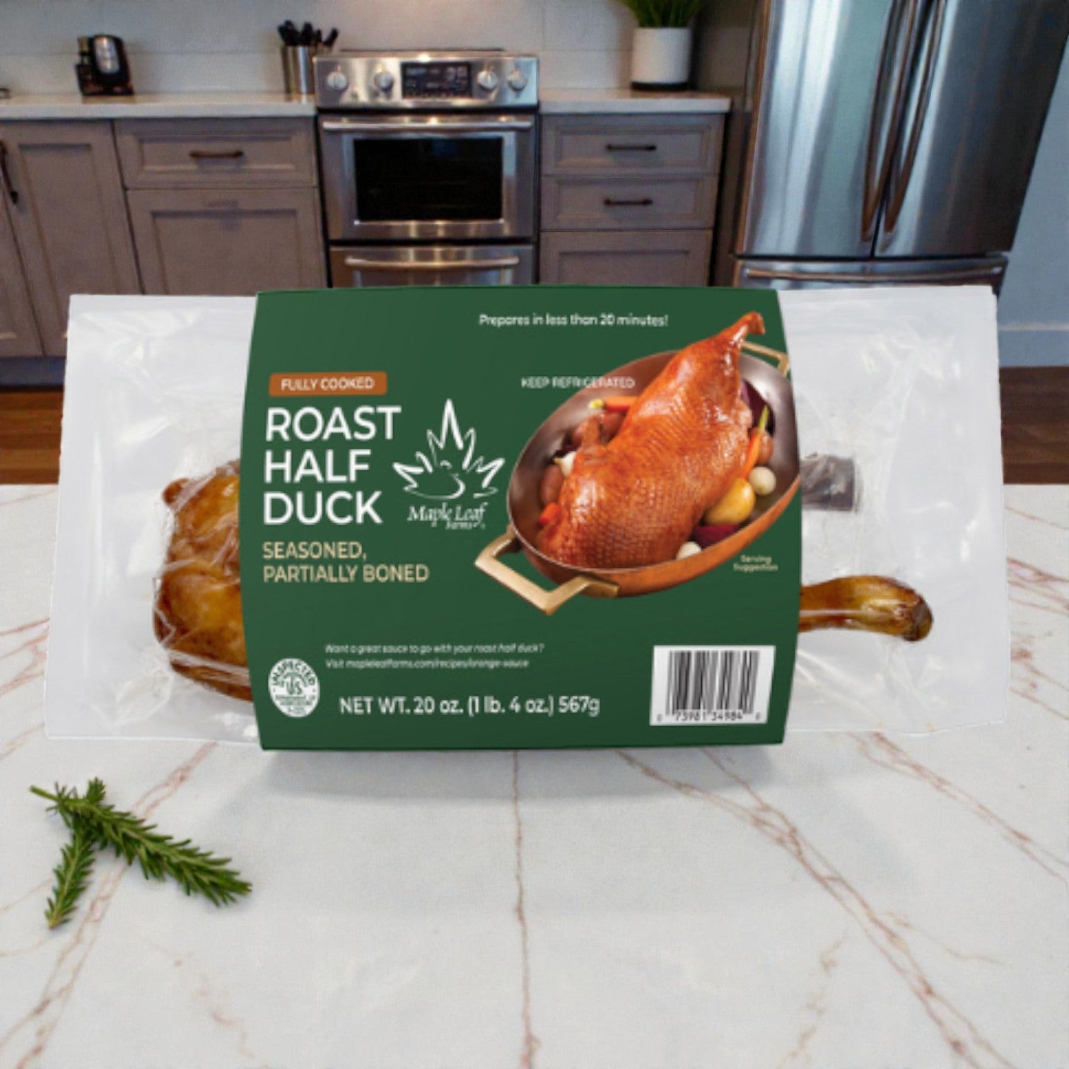 Maple Leaf Farms Half Roast Duck (2 count, 10 oz each) is fully cooked, seasoned, and partially boned. Displayed on a kitchen counter, the package shows product details and serving ideas—ideal for a gourmet main course.