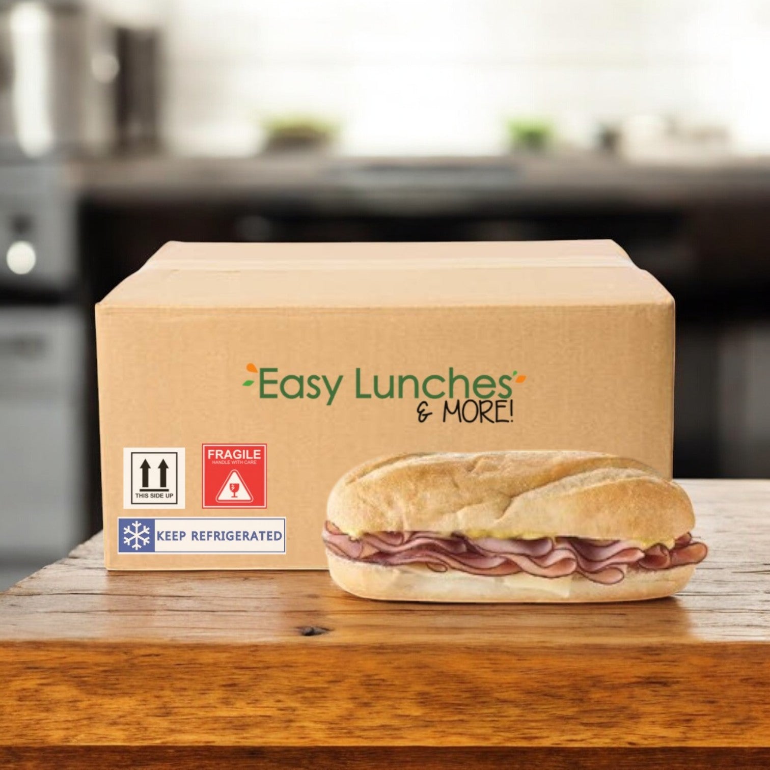 An E.A. Sween box labeled "Smoked Ham & Swiss Cheese Sub, 1 Case, 8 Count—Ships Frozen" sits by a smoked ham and Swiss cheese sub; stickers read "Fragile" and note 30 days shelf life in the cooler after leaving the freezer.