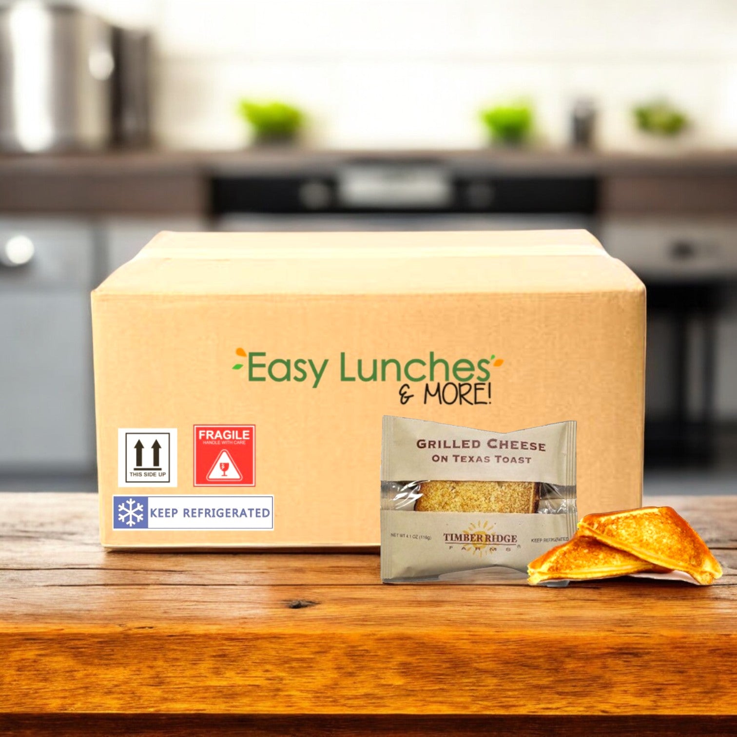 A Timber Ridge Grilled Cheese on Texas Toast box (1 case, 10 count, ships frozen) sits on the counter next to a packaged sandwich and two halves—comfort food from Timber Ridge for any meal.
