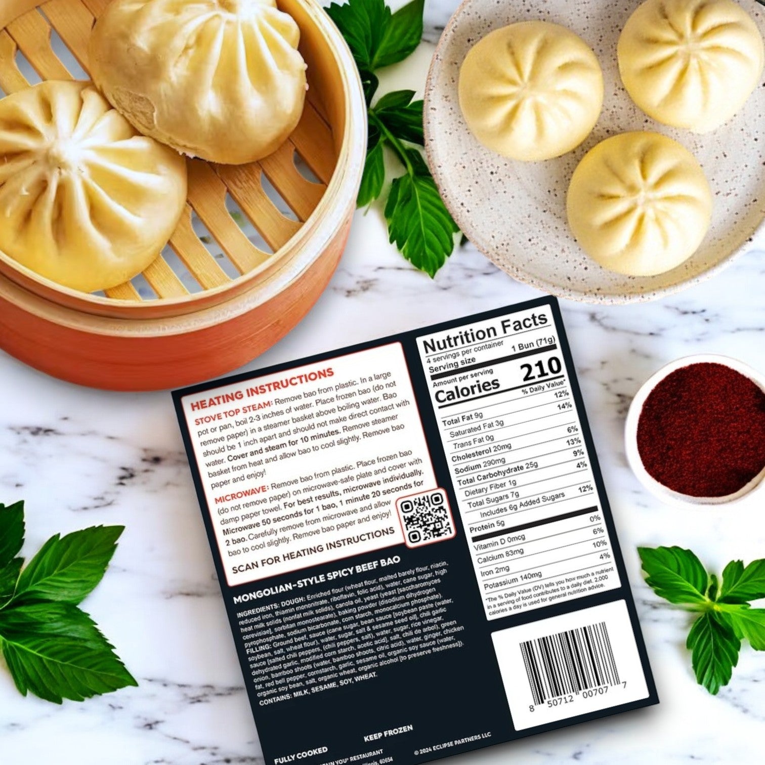 A Wow Bao Mongolian-Style Spicy Beef Bao sits on a marble counter near savory buns, fresh herbs, and spices, with heating instructions and nutrition facts visible, suggesting bold Asian-inspired flavor.