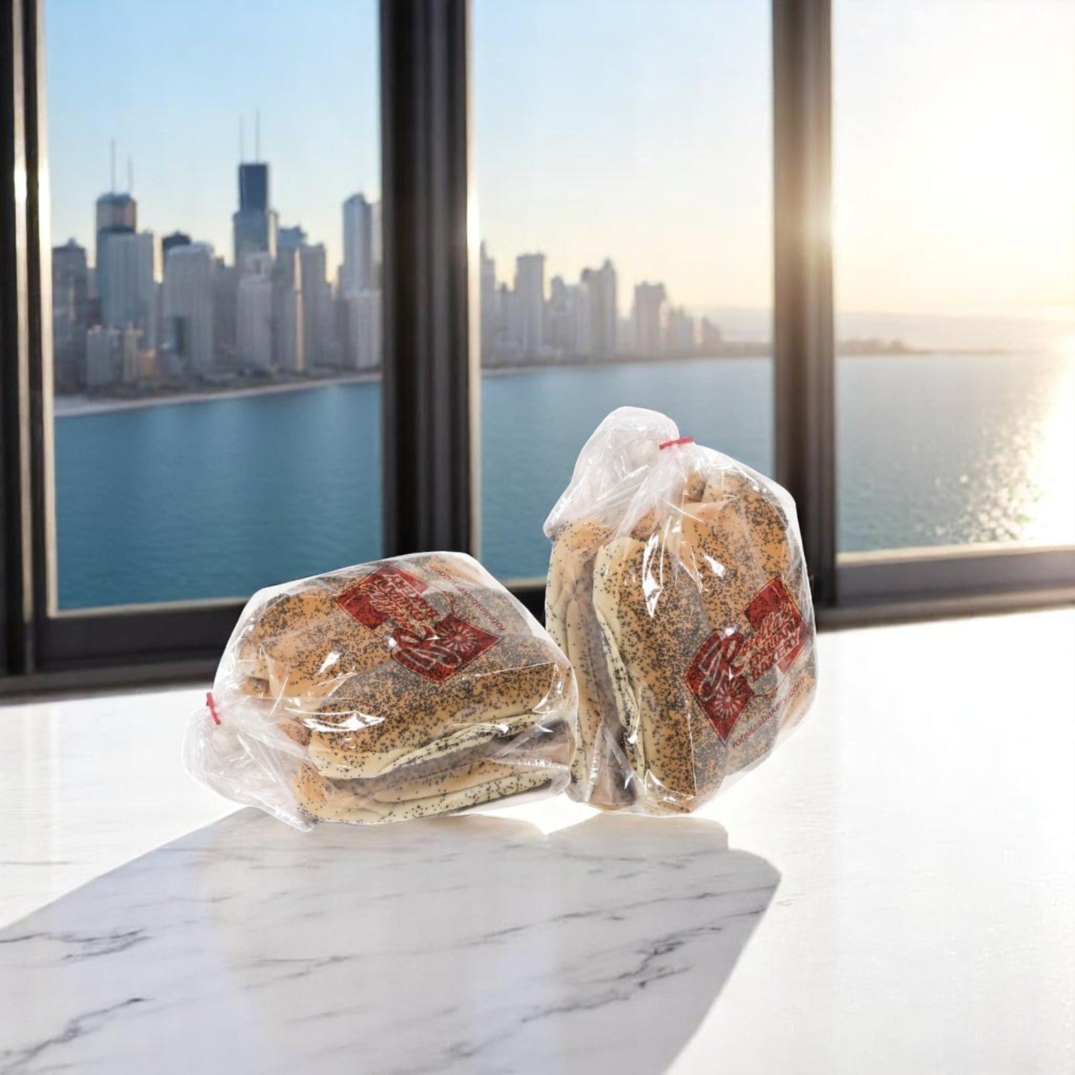 Two bags of Easy Bundle’s Chicago Style Bundle – A True Taste of the Windy City! – sit on a marble countertop by city-view windows at sunrise, making for a perfect way to start the day with authentic flavors.
