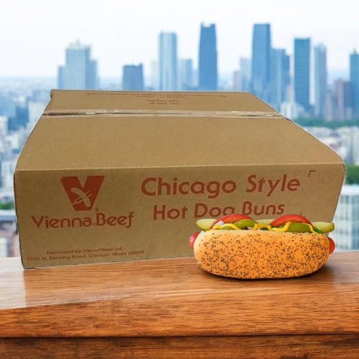 A Vienna Beef Hot Dog Kit—containing 60 hot dogs and 60 buns—sits on a table with the city skyline in the background.