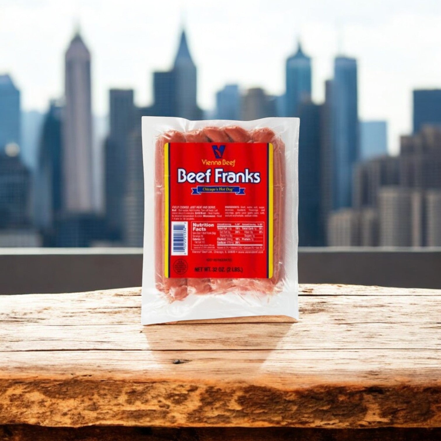 Vienna Beef's 3-Pack Combo of 16 Beef Franks and 8 Maxwell St. Polish Sausages sits on a wooden surface against a city skyline backdrop, capturing the essence of Chicago taste.