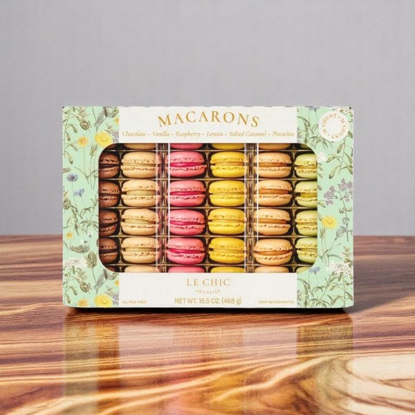 Le Chic Patissier Macarons Variety, 36 Count (1 Pack) by Le Chic Patissier features colorful, gluten-free French-style macarons in elegant floral packaging—an ideal treat for any occasion.