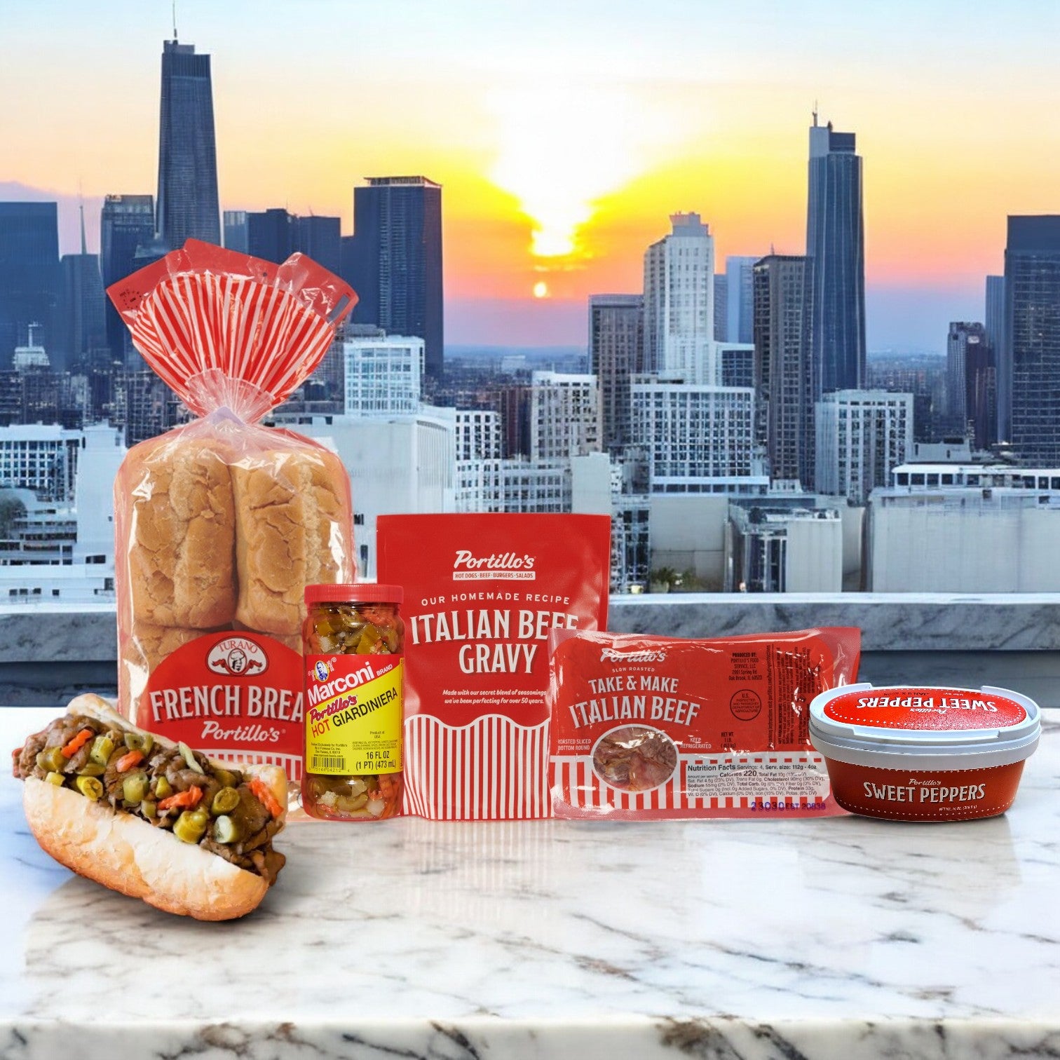 Portillo's 8 Italian Beef Sandwich Bundle, perfect for parties, includes Chicago-style French bread, Italian beef, signature gravy, sweet peppers, and giardiniera—displayed on marble with a city skyline at sunset.