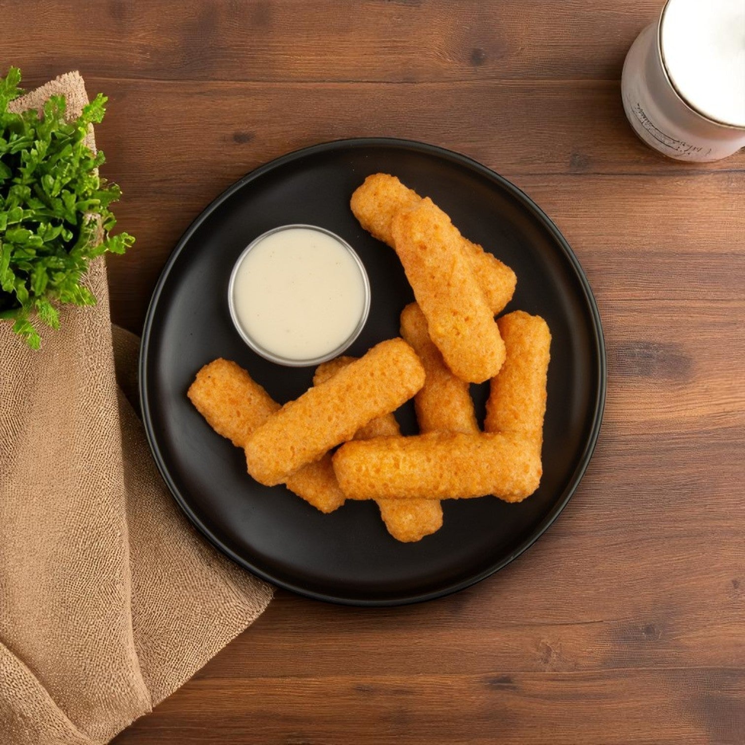 Six battered mozzarella cheese sticks from Sysco’s Mozzarella Cheese Sticks (Battered) 6 Bags of 2 lbs, served with dipping sauce—a delicious appetizer option.
