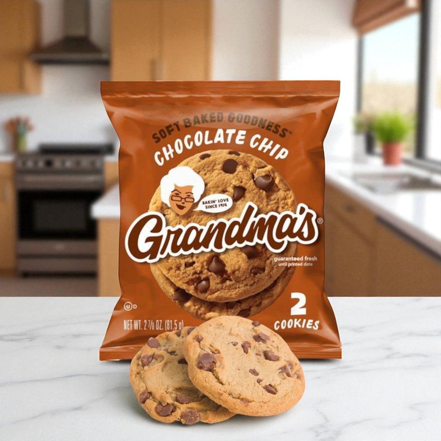 A package of Grandma’s / Cadbury Chocolate Chip Cookies – Individually Wrapped (60/2.5 oz) by Grandma's, with two cookies displayed in front on a kitchen counter.