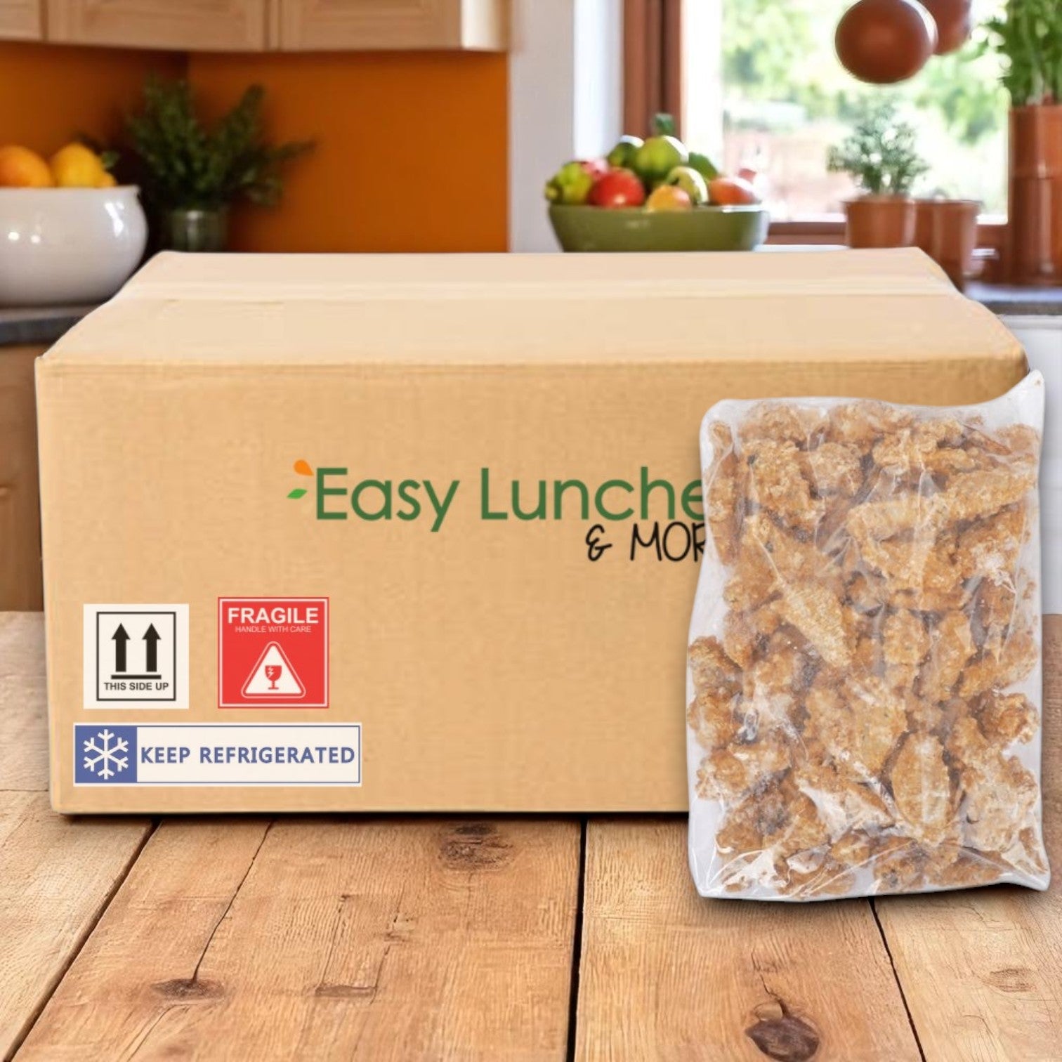 A Pierce shipping box sits on a kitchen table beside a vacuum-sealed bag of Pierce (Pilgrim’s Pride) Chicken Wings Breaded Zing Precooked, Small - 2/7.5 LB.