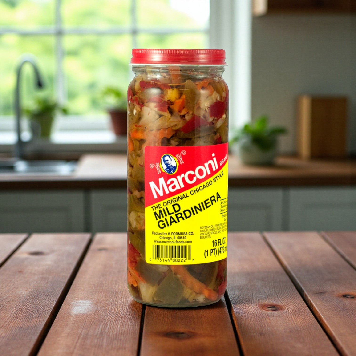 A 3-pack combo of Lou Malnati's, Gino's East, and Giordano's Chicago’s Best Deep Dish Pizza sits on a wooden kitchen counter with a sink and plants in the background, perfect for sharing an authentic pizza night at home.