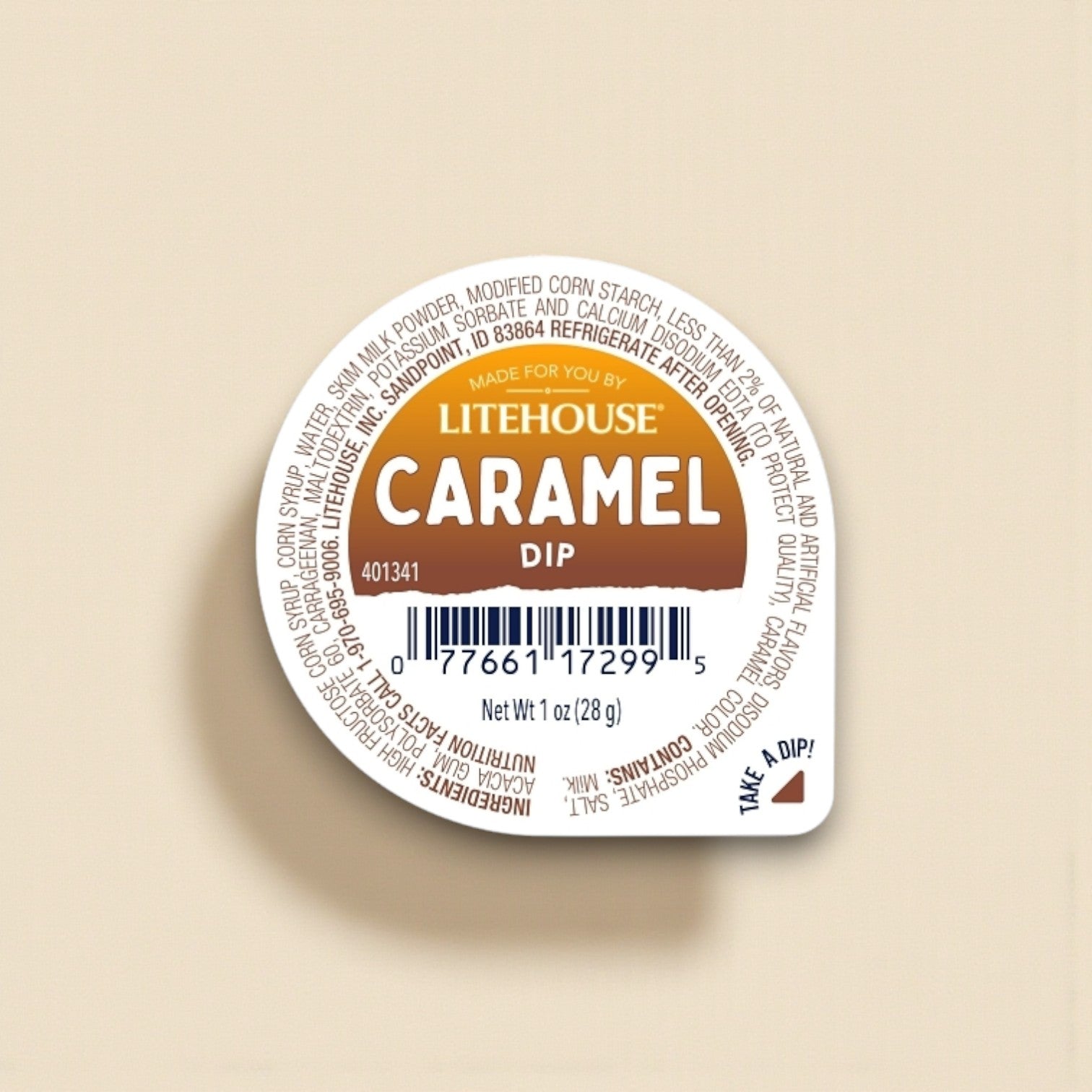 A single-serve 1 oz cup of "made for you" Caramel Dip (100 count case), shelf stable with nutrition info and ingredients on the lid plus a center barcode—ideal as caramel dip for fruit.