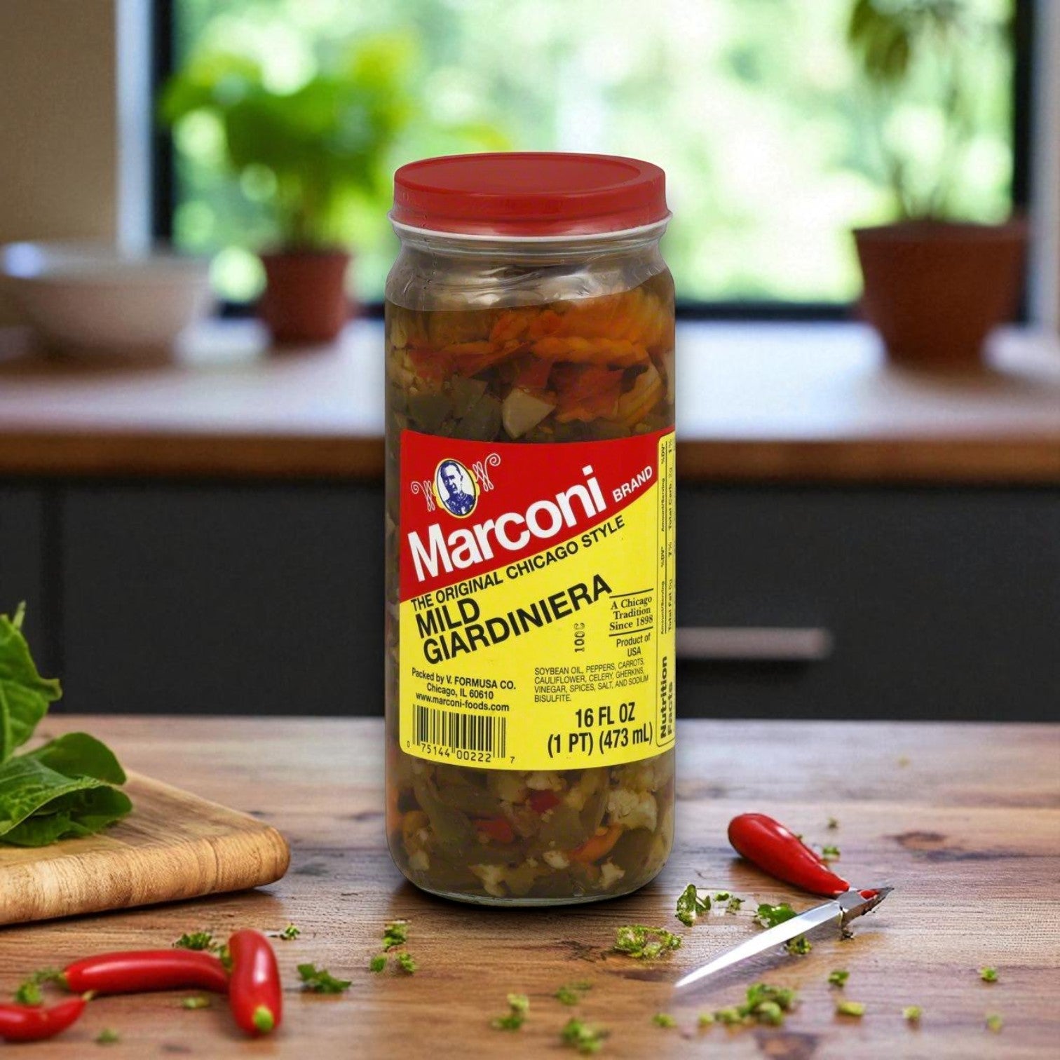 A Chicago Pizza Lovers Bundle from Lou Malnati's—including Home Run Inn, Giordano’s, Uno & Marconi Giardiniera—rests on a wooden countertop with chili peppers, basil, and a knife nearby—perfect for topping your favorite deep dish pizza.