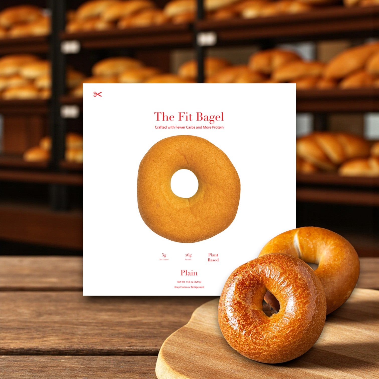 A promotional image shows The Fit Bagel’s Variety Pack—2 Classic, 2 Pretzel Buns, 2 Sesame, and 2 Everything—in packaging, with shelves of bread in the background, highlighting low net carbs and 32 bagels total.