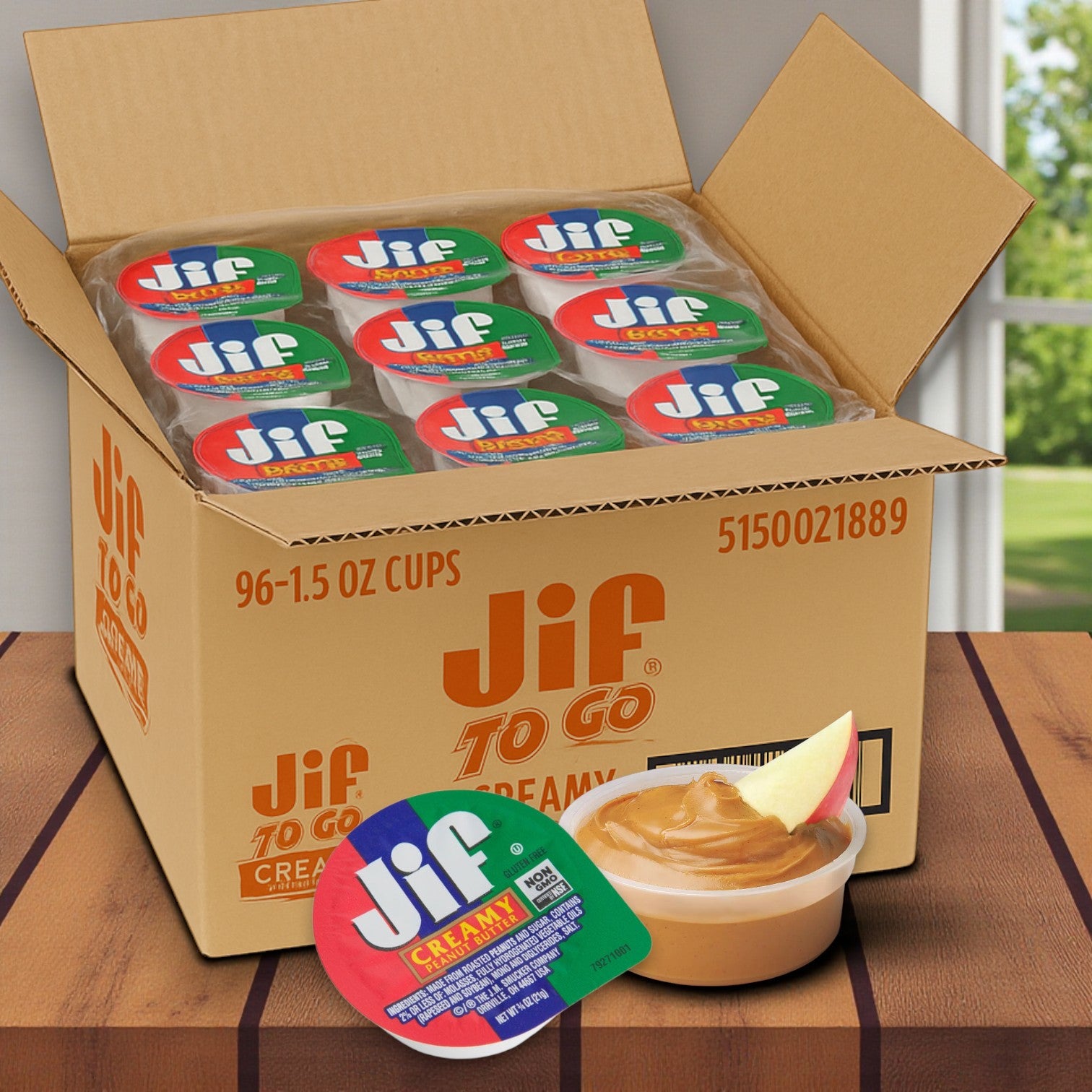 A case of 100 JIF Creamy Peanut Butter Cups, each 0.75 oz—ideal for portable snacking, like dipping apple slices.