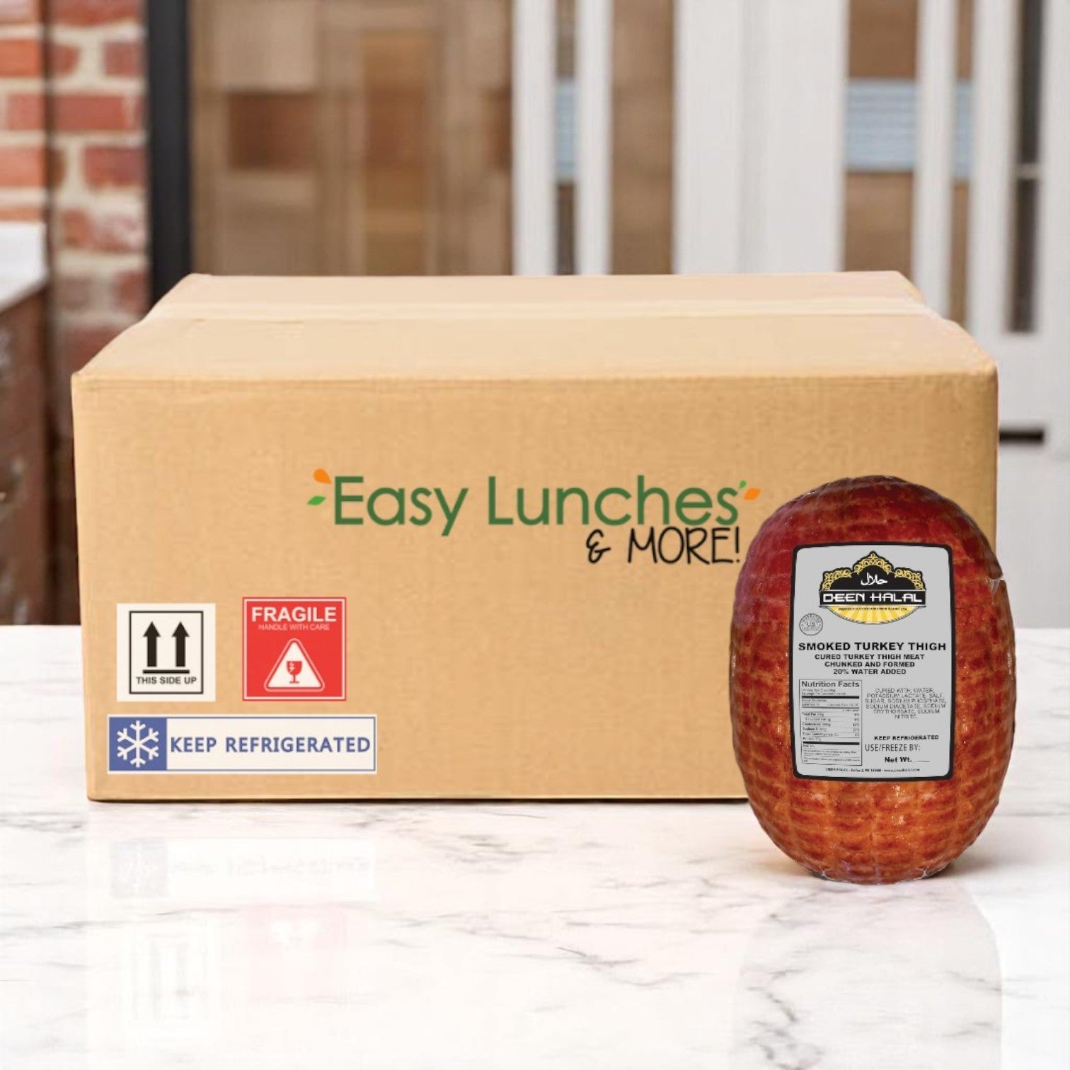 A box labeled “Easy Lunches & More!” sits on a counter next to a packaged, fully cooked Deen Halal Smoked Turkey Thigh (10 lb avg) from Deen Halal.
