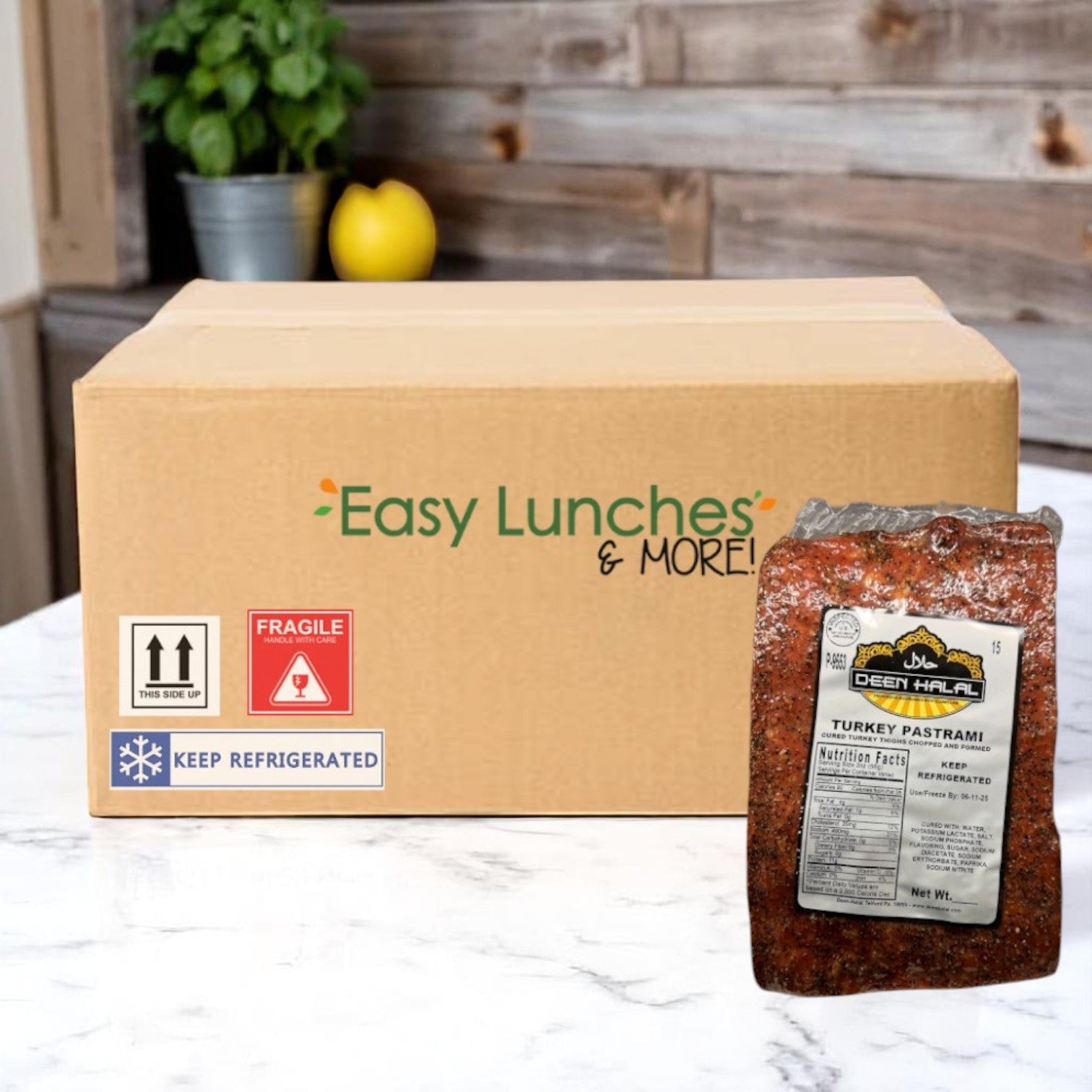 A cardboard box labeled "Easy Lunches & More!" sits on a counter next to a vacuum-sealed Deen Halal Turkey Pastrami Slab—approx. 4 lbs each—for deli-quality taste.