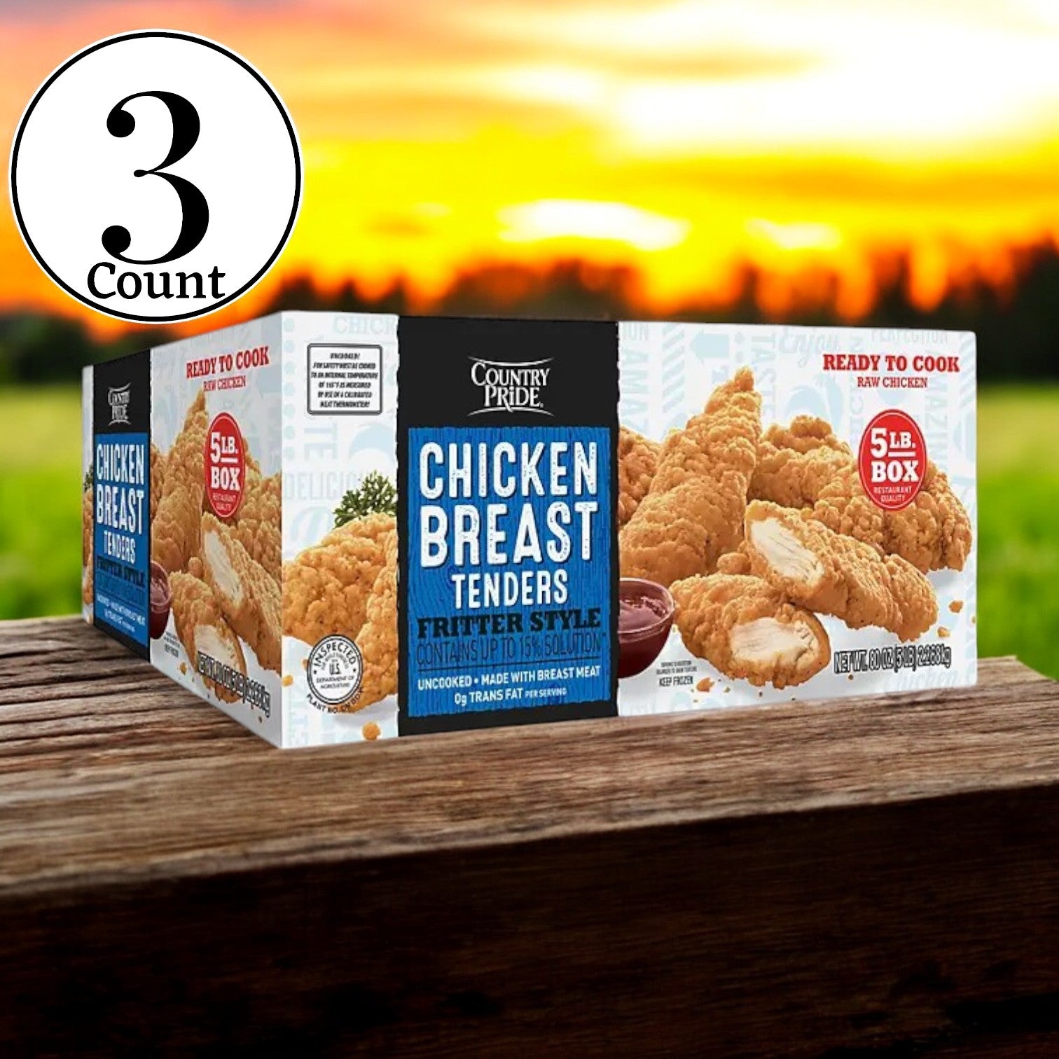 A box of Country Pride Ready to Cook Chicken Breast Tenders, weighing 5 lbs., rests on a wooden surface with a picturesque grassy field and sunset in the background. The "3 Box-15 Total Pounds" label is prominently displayed in the top left corner, highlighting both convenience and quality.