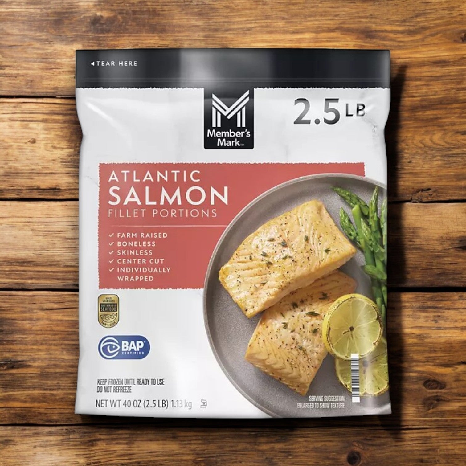 Member's Mark Salmon Filet Portions, 40 oz., highlight farm-raised, boneless, skinless, center-cut features. Individually wrapped on a wooden surface, this product supports sustainable fisheries and is rich in Omega-3 fatty acids for a healthy meal option.