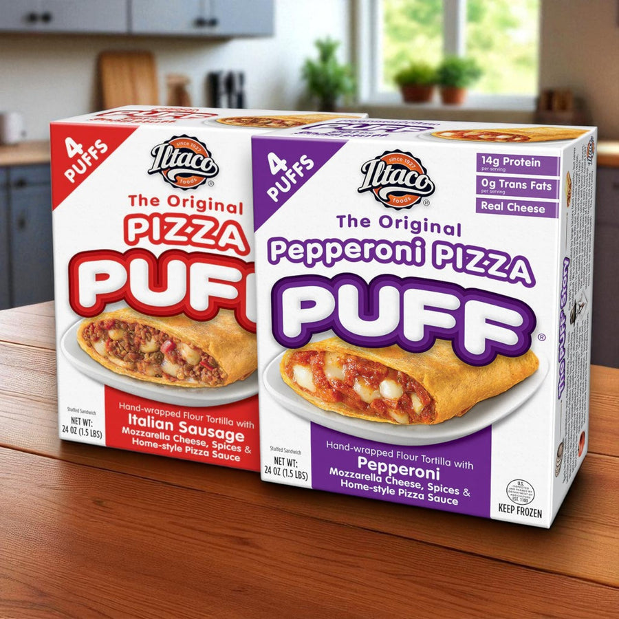 Two boxes of Iltaco Foods Pizza Puff Variety Pack, Original Sausage & Pepperoni (2 x 24 oz), displayed on a wooden counter in a kitchen setting.