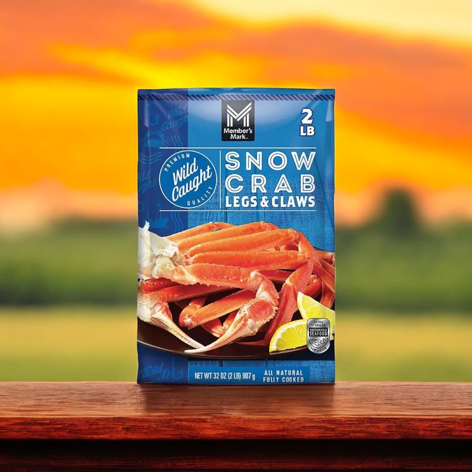 A package of Member's Mark Snow Crab Legs and Claw-1 Count is elegantly displayed on a wooden surface with an outdoor background, offering a delightful seafood experience.