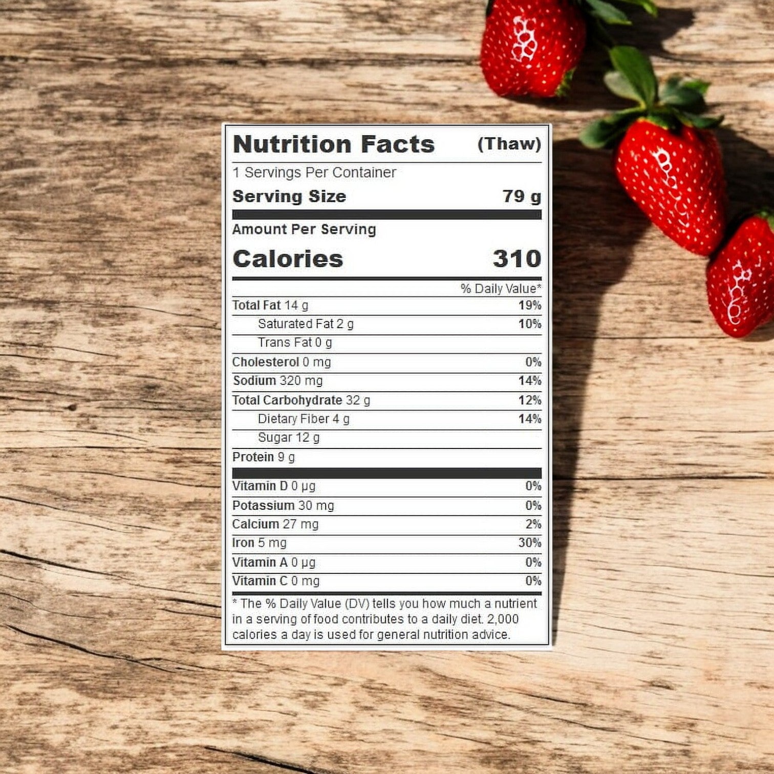 A nutrition label with details such as 310 calories per serving, 14g total fat, 32g total carbohydrates, and 4g protein accompanies the Sunwise Sunbutter and Strawberry Jelly Sandwich. Strawberries are placed on the wooden surface beside the label, next to a jar of sunflower seed butter for a nutritious snack option.