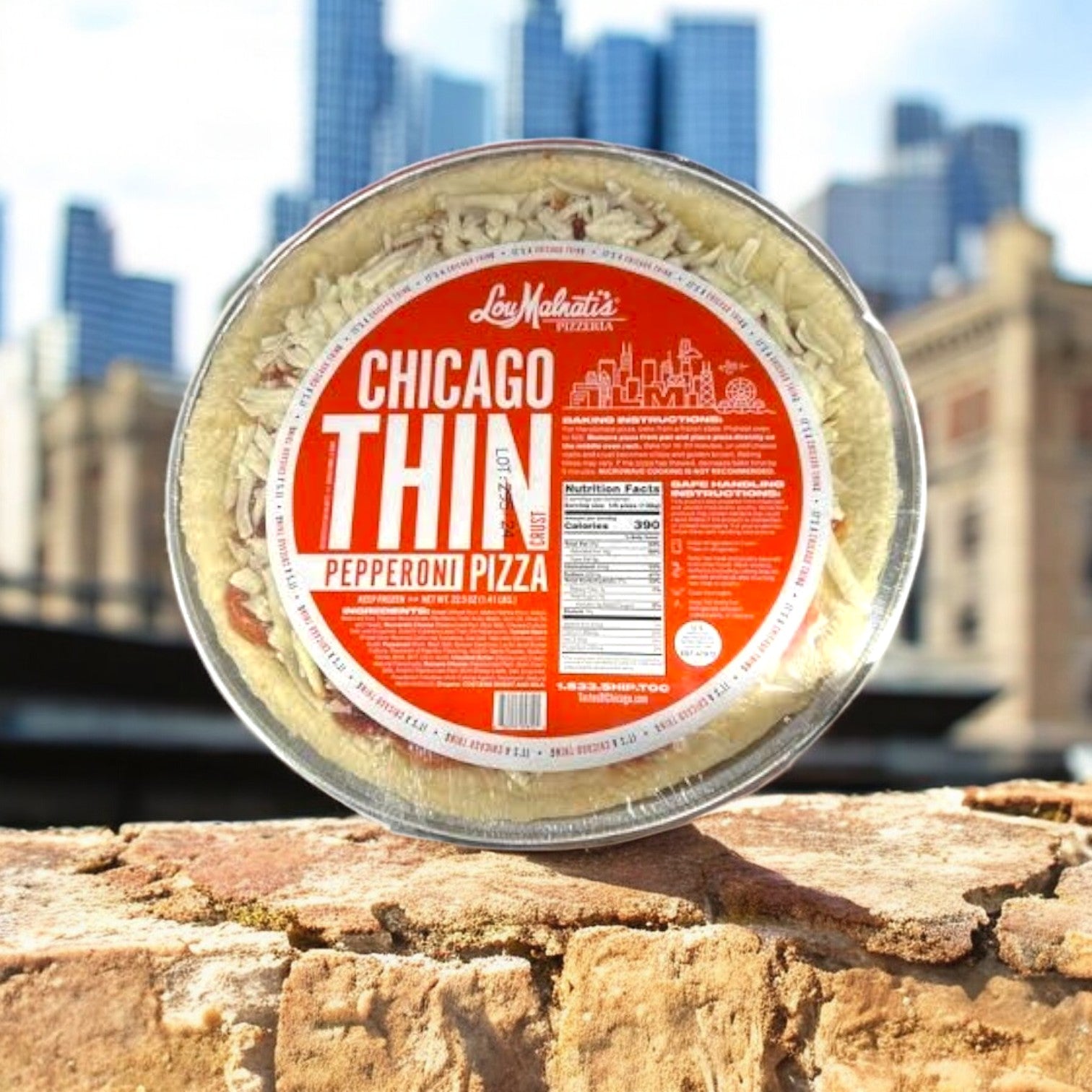 A 22.5 oz round package of Lou Malnati's Chicago Thin Pepperoni Pizza, featuring a crispy thin crust, against an urban skyline with towering skyscrapers, captures authentic flavor.