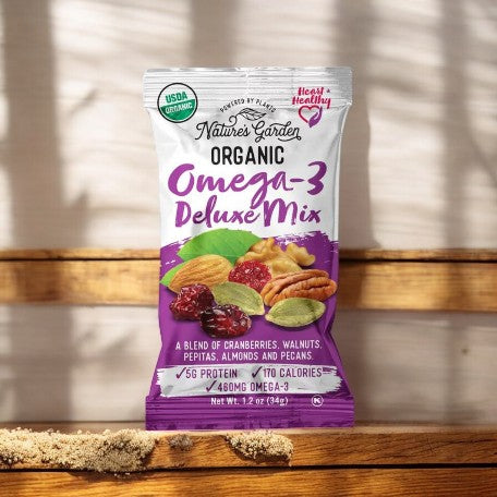 A 1.2 oz package of Nature Garden Trail Mix Omega-3-1 Count contains a heart-healthy blend of cranberries, walnuts, pepitas, almonds, and pecans. Each serving delivers 5g of protein, 170 calories, and 460mg of Omega-3. This mix from Nature Garden is certified USDA Organic.