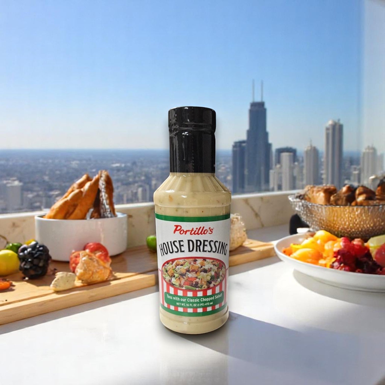 A 3-Pack Portillo’s Combo from Portillo's is displayed on a table with assorted food, including Chicago-style Italian Beef, and a city skyline in the background.