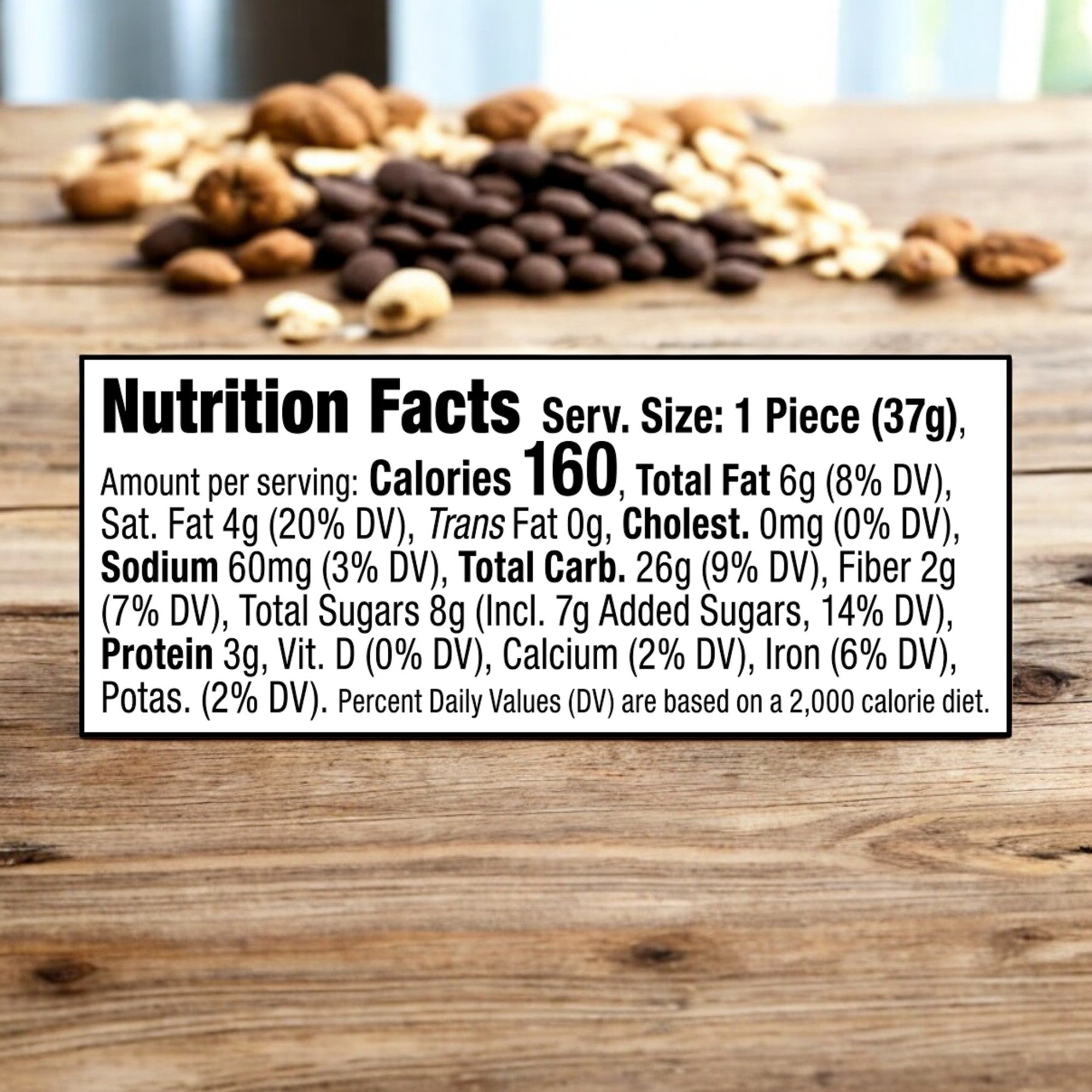 The nutrition facts label for Bobo's PB & Chocolate Chip Oat Bites, 1.3 oz - 1 Count, indicates a serving size of 1 piece (37g) with 160 calories, 8g of total fat, and 26g of total carbohydrates. Wholesome ingredients are emphasized while oats and nuts are blurred in the background.