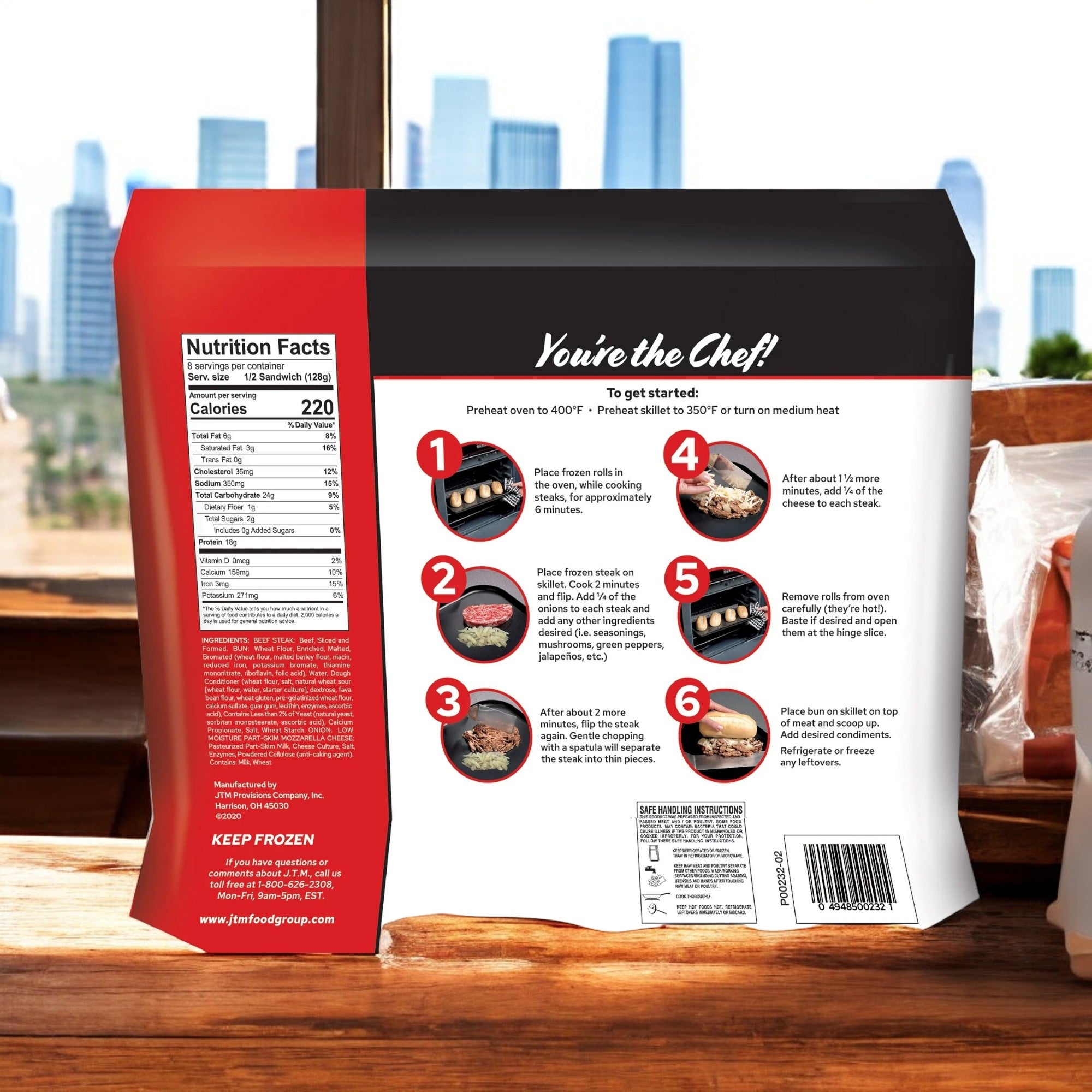 The back of a J.T.M. Beef Philly Cheese Steak Kit - 3 Count features cooking instructions and nutrition facts, with a city skyline visible through a window in the background.