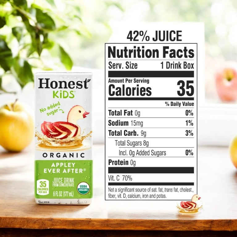 A single 6 oz "Honest Kids Organic Apple Juice" sits on a table. This healthy beverage for kids by Honest Kids contains 35 calories per serving, 42% organic apple juice content, and 8g total sugars. Proudly organic with no added sugar, this drink is a nutritious choice for children.