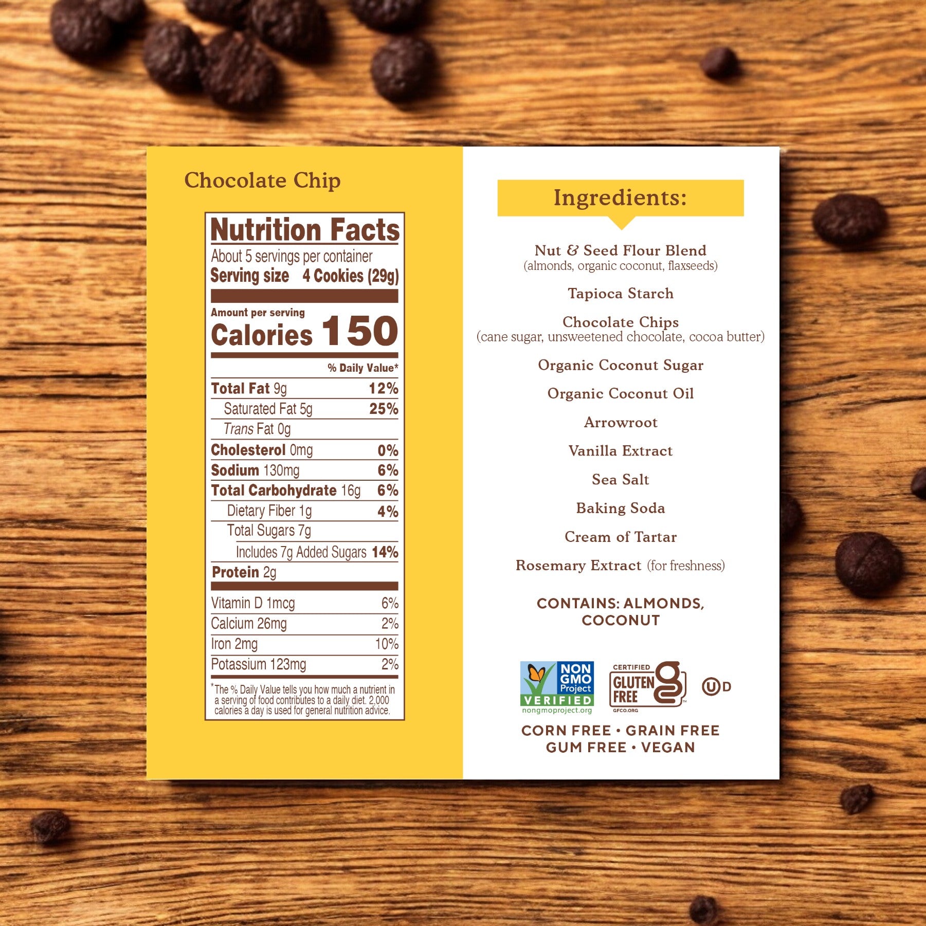 A nutrition facts and ingredients label for Simple Mills Chocolate Chip Cookies Box 5.5 oz, detailing calories, fats, cholesterol, sodium, carbs, and protein. The label features non-GMO, dairy-free, gluten-free, gum-free, and vegan icons along with a highlight on the all-natural ingredients used.